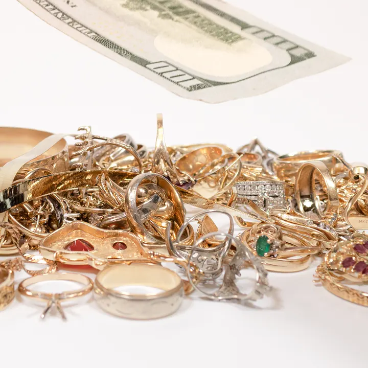 Pile of broken gold rings, chains and bracelets sold as scrap gold
