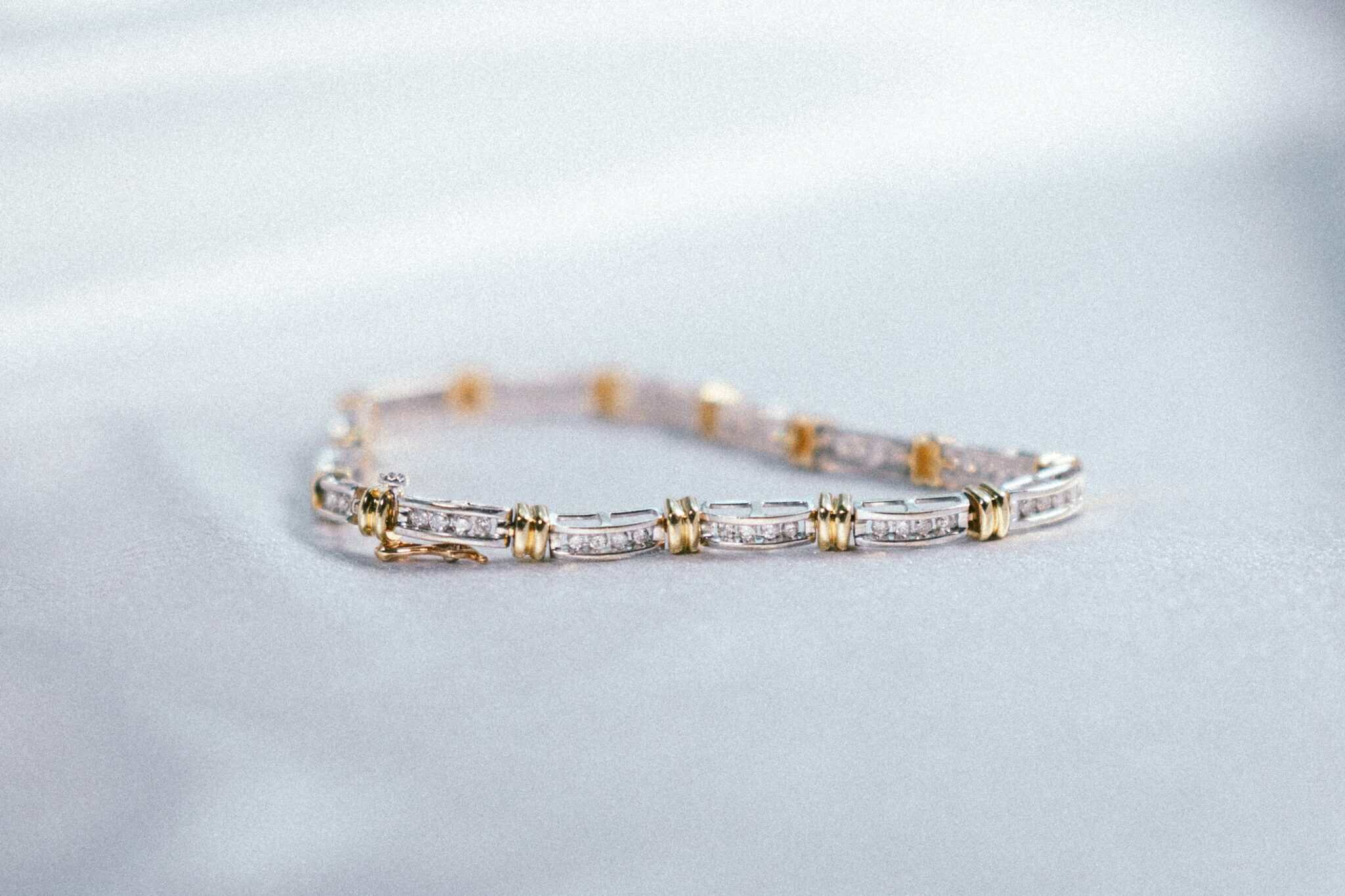 Bracelet featuring gold and silver links, showcasing fine craftsmanship and luxury jewelry design.
