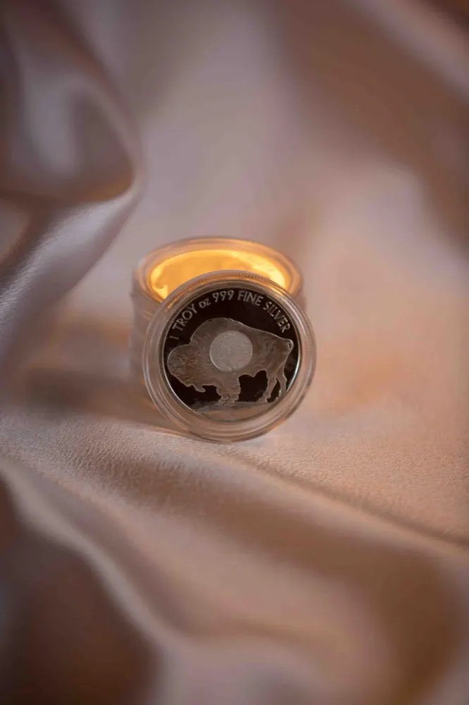 A one troy ounce .999 fine silver buffalo round in a protective capsule