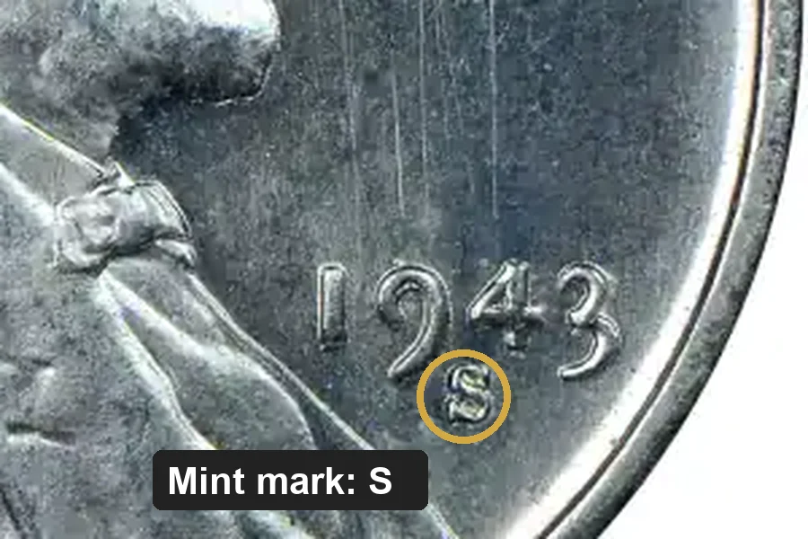 Close-up of a 1943-S steel penny with the S mint mark circled below the date, a detail that can change its value