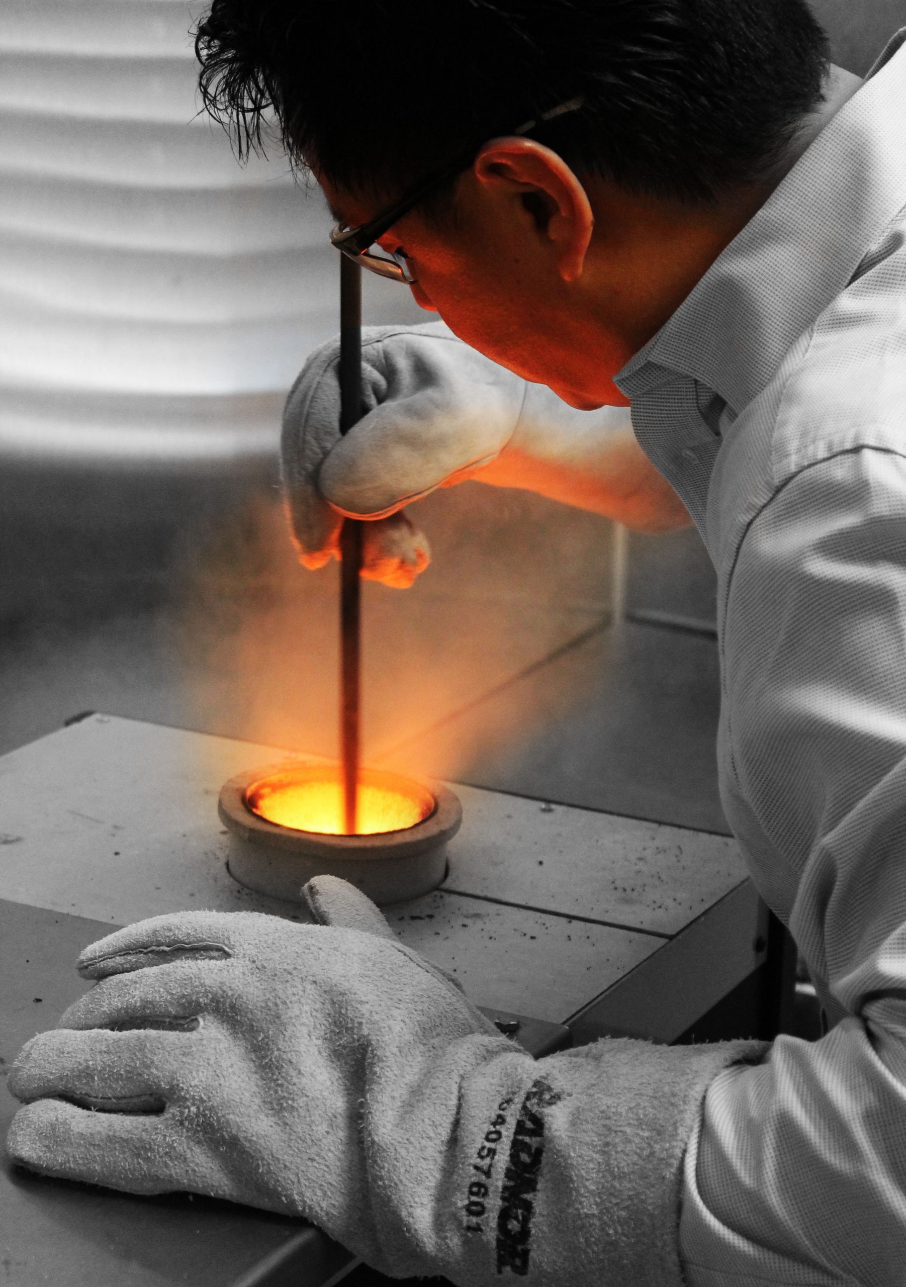 We stir the molten gold to even the gold to a homogenous mixture
