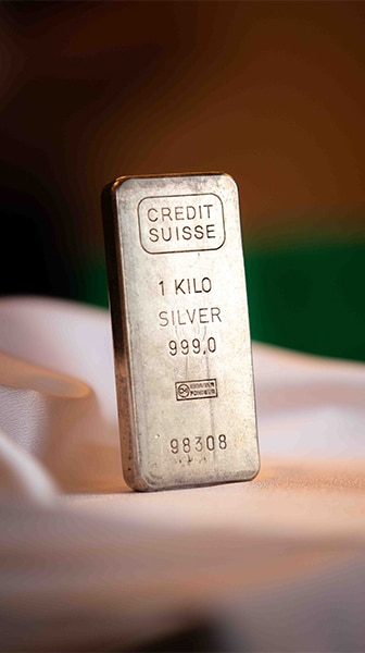 This high-resolution image showcases the exceptional quality and beauty of a 1 kilo Credit Suisse silver bar - a premium investment option for those seeking to diversify their portfolio and protect their wealth. Made with .999 fine silver, this bullion bar offers unmatched durability and value, making it an ideal choice for long-term stability and growth. The front of the bar displays the renowned Credit Suisse name and logo, along with the weight and purity of the bar. Invest in a 1 kilo Credit Suisse silver bar today and experience the benefits of holding precious metals in your investment strategy!