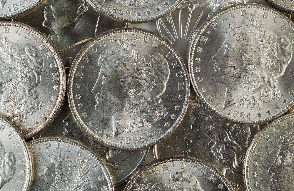 A series of silver dollar coins from the US Mint, representing the final year of their production. Explore the historical significance and collectible value of these coins.