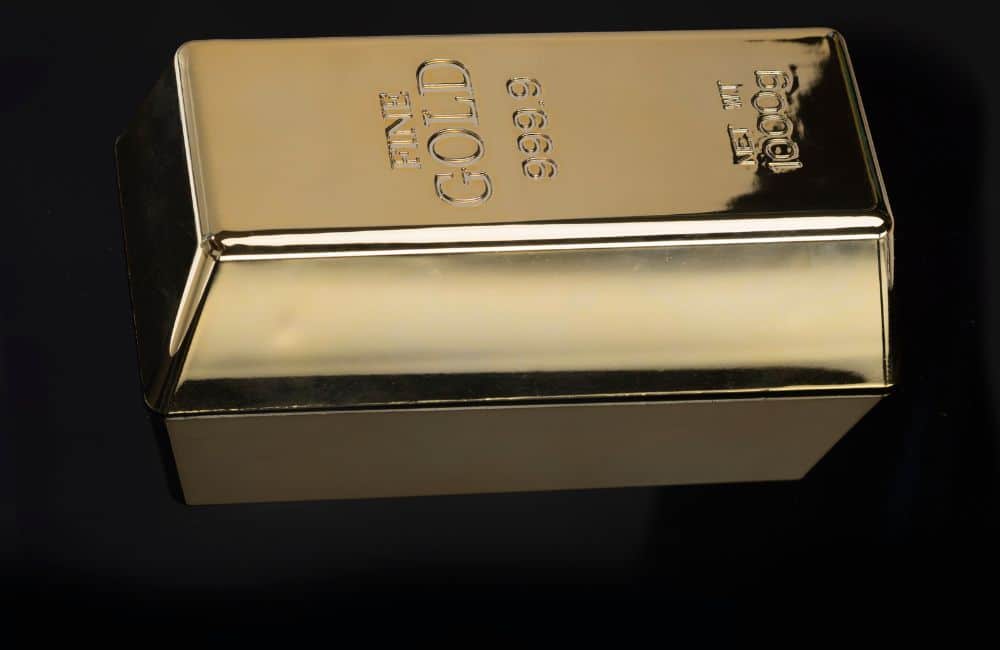 An open book representing a comprehensive guide to acquiring gold bullion. The guide provides valuable information and tips while emphasizing the importance of maintaining keyword integrity.