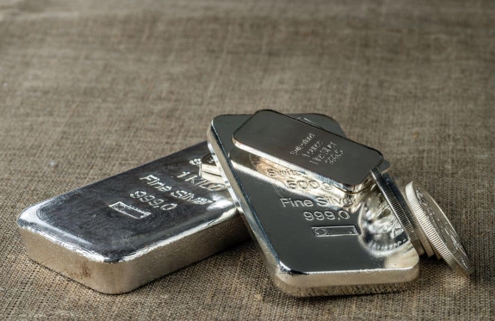 A stack of silver bullion and silver bars, symbolizing investment opportunities.
