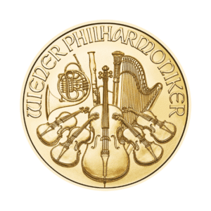 Gold coin featuring detailed engravings of classical musical instruments with the text "austrian philharmonic gold coin.