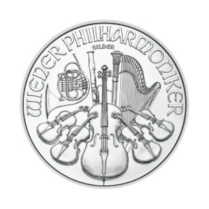 A 2023 silver coin featuring a detailed engraving of various orchestral instruments, including a violin, a trumpet, a harp, and a French horn, with the text "Wiener Phil