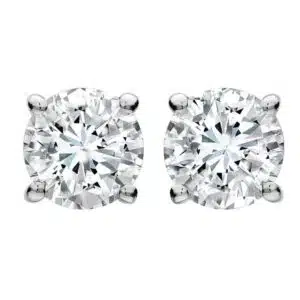 Pair of sparkling diamond stud earrings with silver settings.