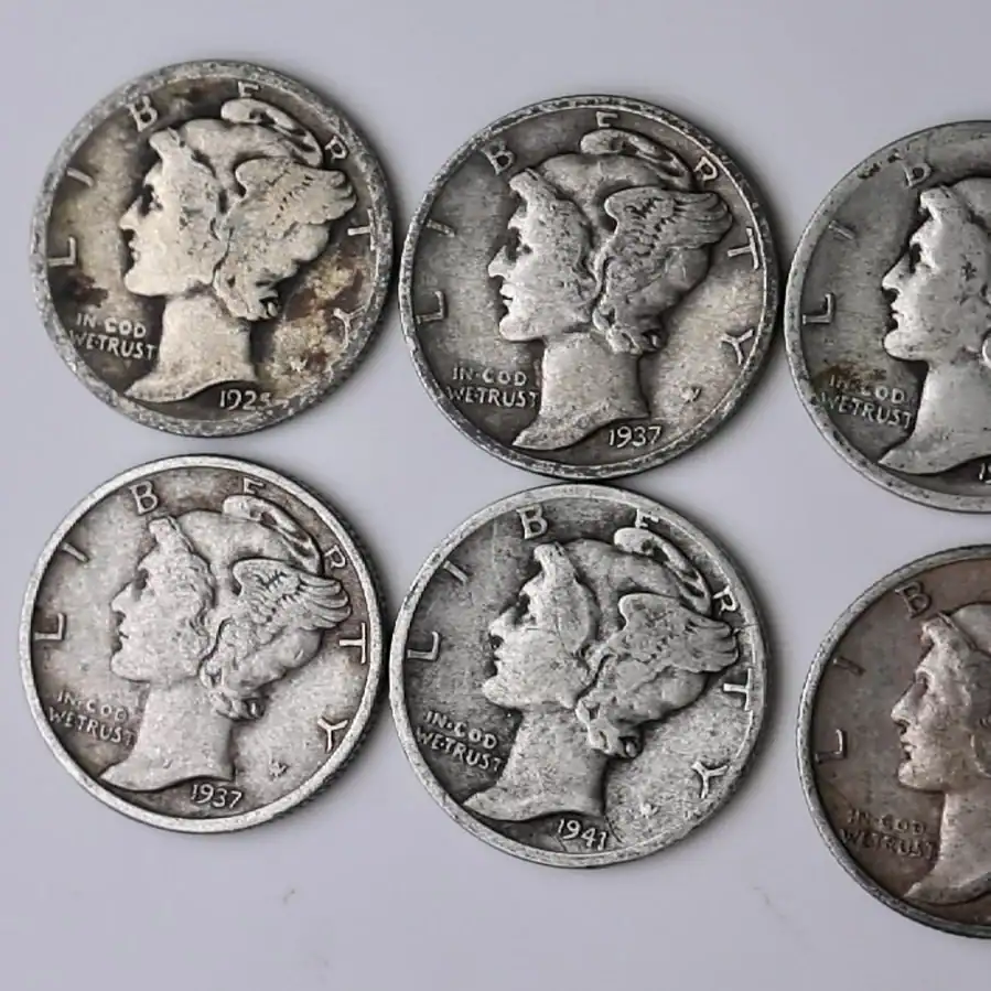 Collection of Mercury dimes from 1925 to 1941 showing different mint years.