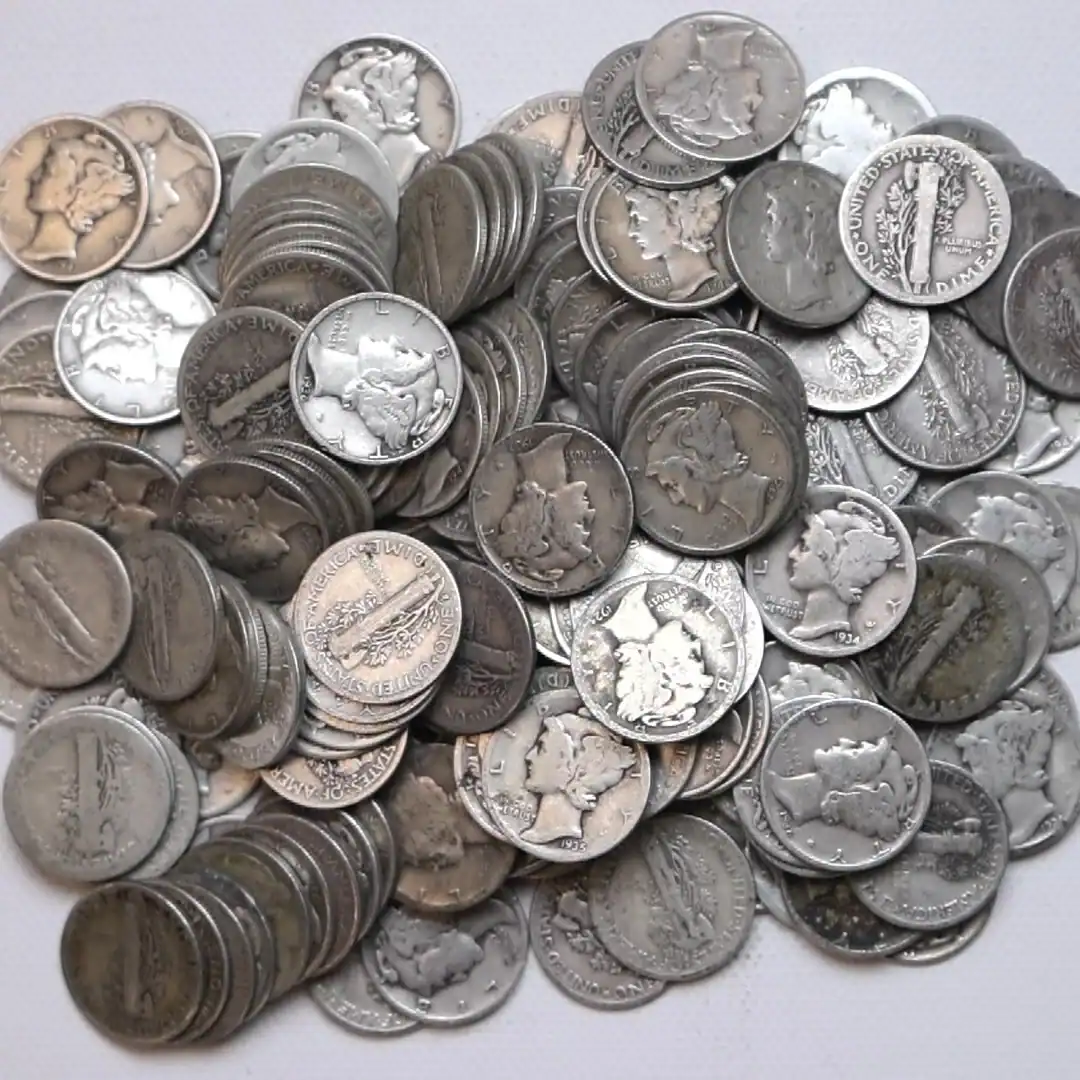 Assorted Mercury Dimes coins from various years and mints.