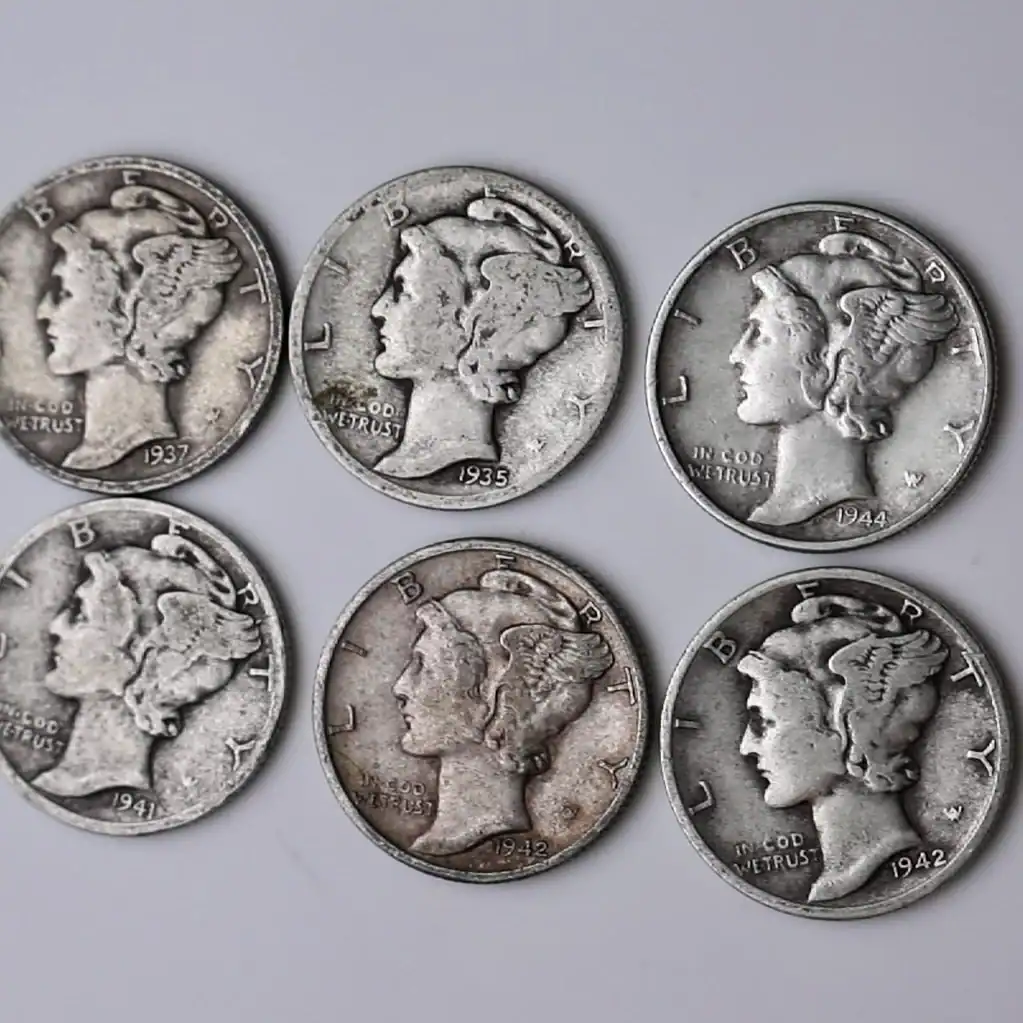 Collection of Mercury dimes from 1937 to 1942, showing different mint years and conditions.