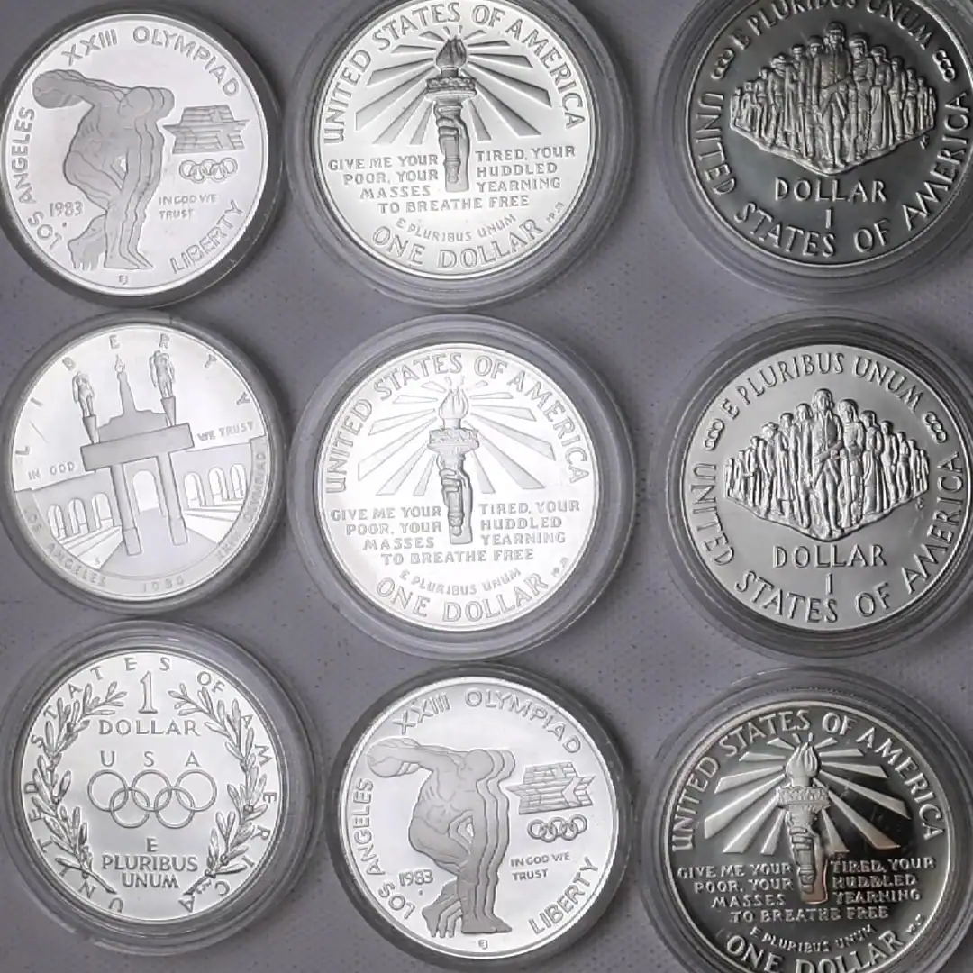 Close-up of various United States Olympic and commemorative coins.